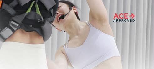 Bungee instructor training in a bright studio